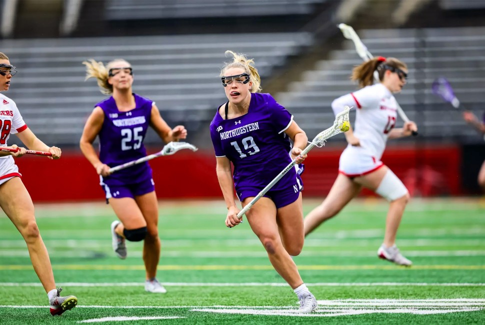 Northwestern lacrosse players on the field
