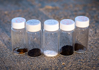 vials of materials on a concrete background